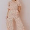 Lexi Floral Jumpsuit Apricot Dresses